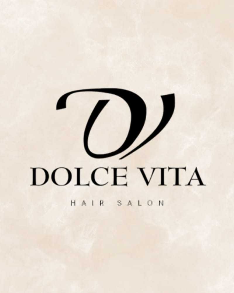 Portrait of Brigitta, a professional stylist at Salon Dolce Vita, showcasing their expertise and style.